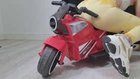 Toy Motorbike Ride in Tight Sports Outfit – Brat Girl & Loud Farts Roleplay