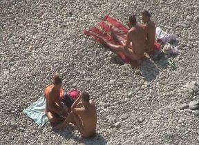 Awesome voyeur video from the nudist beach with some amateur strangers