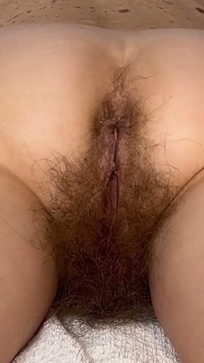 Super hairy mature MILF ass oil massage.   Clip 1