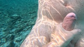 Underwater handjob to stranger