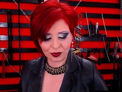 Seductive Red Head Dom Milf Smoking On Cam In Boots