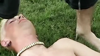 Blond twink Shane Allen pissed on in outdoor group fetish scene