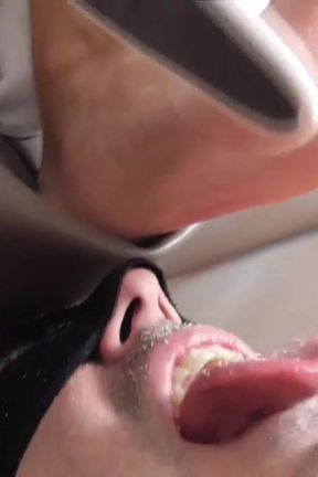 Rubbing and filing their soles into his mouth