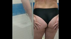 Sexy tranny wearing one piece swimsuit and jerking