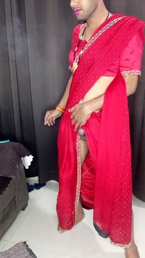 Indian sissy wearing hot red saree and red peticot