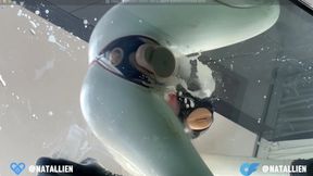 Latex-clad Natallien humiliates and fucks her girlfriend in a rubber catsuit