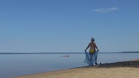 my wife is on the beach in a yellow bikini