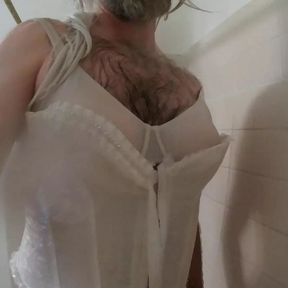 Corset Wearing Crossdresser in the shower