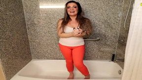 whitney morgan pissing orange pants in bathtub omorashi