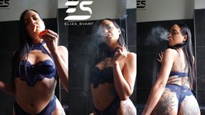 Smoking in dark blue undies with matches light up