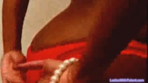 Tiffany Divine in red bottoms getting dressed
