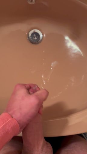 Fat cock squirts in the sink
