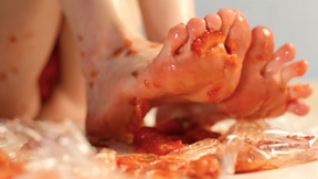 crushing ripe fruit under soft soles