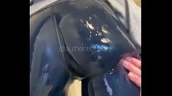 Showering in tight leggings and baggy hoody in wetlook video