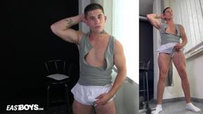 Twink muscle bulk boy flexing with boner