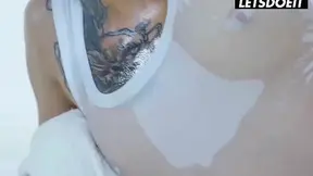Tattooed babe rides his oiled cock in the tub till her thighs shake