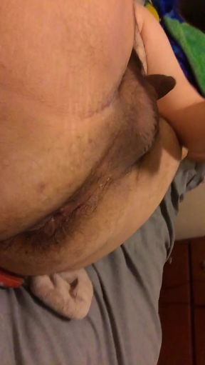 Solo babe pleasures herself while lying down