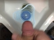 horny hairy trucker masturbates into truck stop urinal