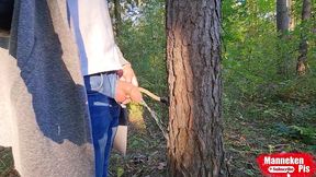 i pee outdoors in the forest under a tree