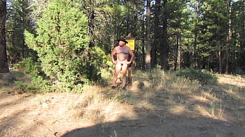 Naked at the campfire sign.