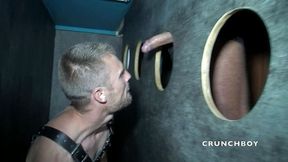 A gay is sucking XXL blakc cock in gloryholes