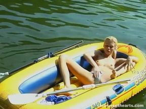 Debbie Masturbating in a Rubber Boat