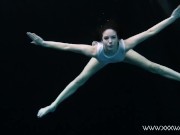 Andrejka swims naked in the pool