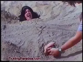 Jenny Buried in Sand and Tickled!