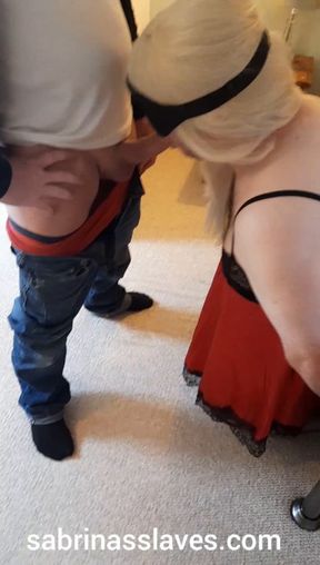 Getting my blindfolded sub sucking cock