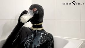 Rubber Slut Swallowing And Bathing In Milk