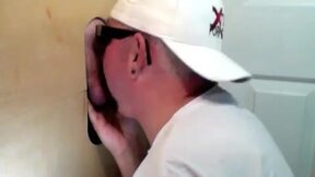 Horny dude with glasses enjoys in a glory hole scene