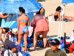 Beach voyeur spying on sexy amateur babes in tight bikinis