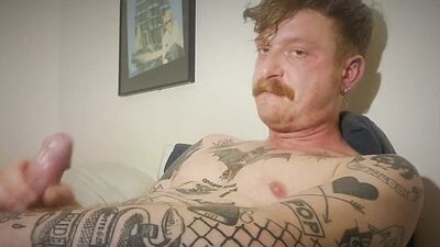 Hot tattoed redhead daddy jerks off and uses fleshligt