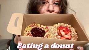 Eating a donut