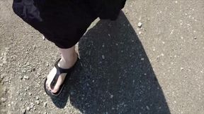Outdoor in a Black Caftan and Barefoot in Black Birkenstocks
