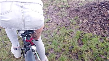 Naughty teen rides dildo in her miniskirt on public bike