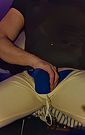 Spandex and thong bulge play in slo mo