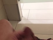 trying not to get caught jerking off in a busy public bathroom