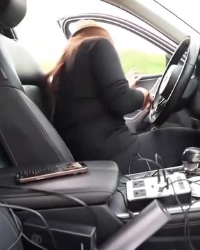 Woman driving car