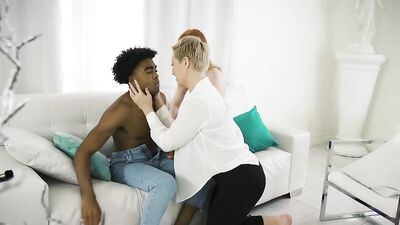 Blonde MILF and a younger redhead share a big black dick