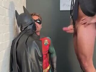 Batman and Robin sucking Joker and getting cum on their faces.