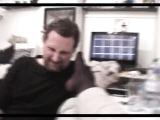 Feet in hose stuffed in thrall's throat