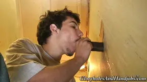 White guy gives a blowjob and a handjob to Black dude