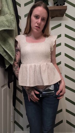 Tiny amateur girl performs a sultry striptease solo