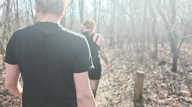 Two guys pick up a hitchhiker and fuck her hard in the woods while she deepthroats them both