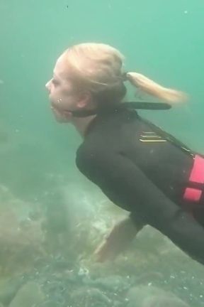 Ocean Rope Bondage with Ballgag in Wetsuit