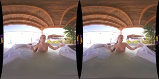 Sexy blonde naked in hot tub