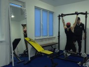 The coach got excited about the student and fucked him in the gym on the simulator