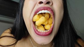 Mouth full and food chewed.