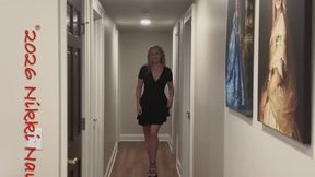 Dancing and stripping for you in a long hallway.